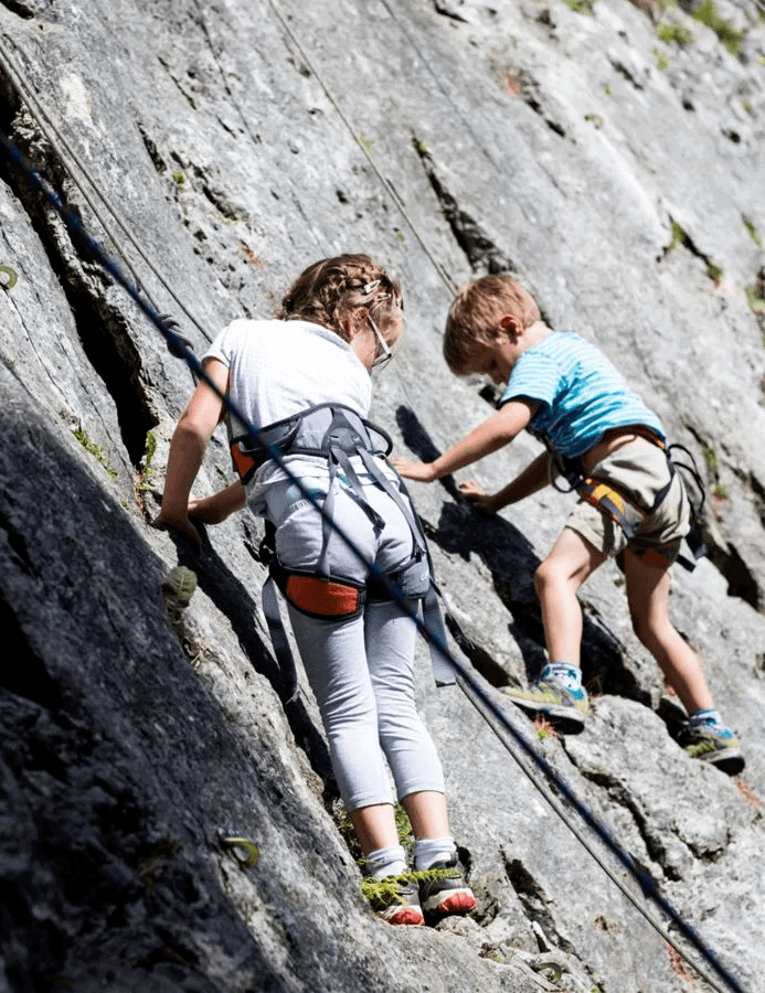 Bouldering on the dolomite rock under the Latemar
