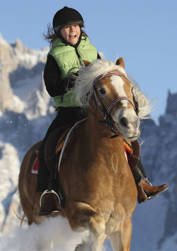 Ice skating and horse riding in the Dolomites