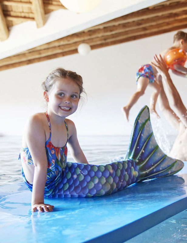 Mermaids swim 